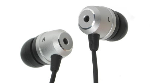 Denon AH-C551 earphones against a white background.Denon AH-C551 earphones isolated on white background.