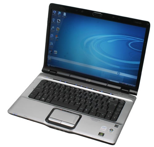 HP Pavilion dv6750ea laptop open on deskHP Pavilion dv6750ea laptop with open lid displaying screen.