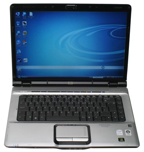 HP Pavilion dv6750ea laptop with open lid displaying screen.HP Pavilion dv6750ea laptop with screen displaying desktop.