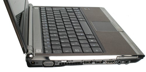 Asus U2E notebook side view showing ports and keyboard.Asus U2E Ultra-Portable Notebook side view showing ports and keyboard.