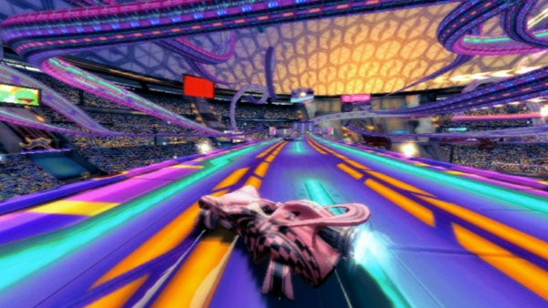 Colorful futuristic race track from Speed Racer movie.Futuristic race car speeding on a vibrant track.
