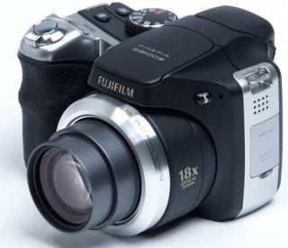 Fujifilm Finepix S8100fd digital camera on white background.