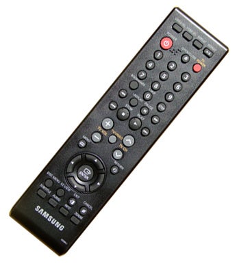 Samsung DVD player remote control on white background.Samsung DVD-1080P8 DVD player remote control.