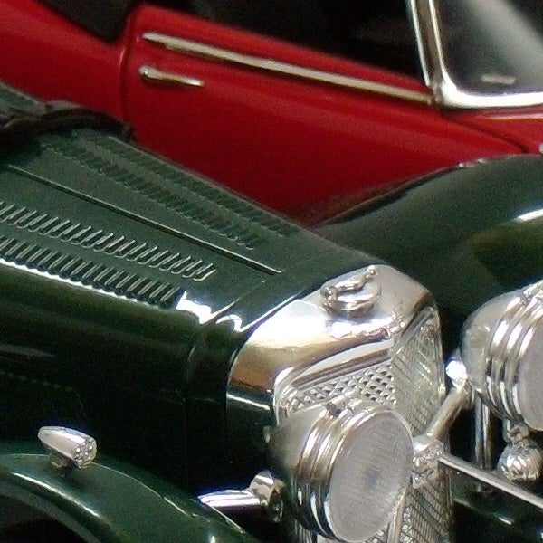 Close-up photo of a vintage car model taken with Nikon CoolPix P60.Close-up photo of a vintage car taken with Nikon CoolPix P60