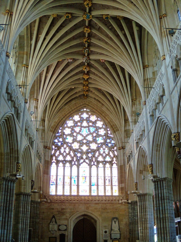 Vaulted ceiling and stained glass window in a cathedralPhoto taken with Nikon CoolPix P60 of a cathedral interior.