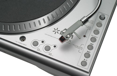 Close-up of ION Audio USB/iPod Turntable controls and tonearm.Close-up of ION Audio Turntable controls and tonearm.