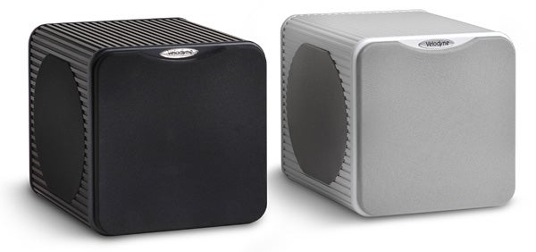 Black and white Velodyne MicroVee subwoofers side by side.Black and silver Velodyne MicroVee Subwoofers side by side.