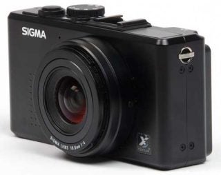 Sigma DP1 compact camera on white background