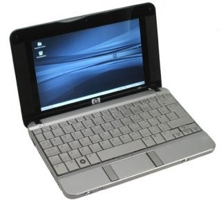 HP 2133 Mini-Note PC with open Linux desktop screen.