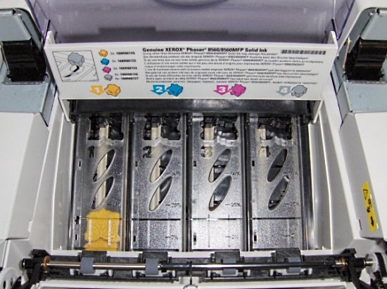 Xerox Phaser 8560MFP Solid Ink slots open for refilling.Inside view of Xerox Phaser 8560MFP/N Solid Ink slots.