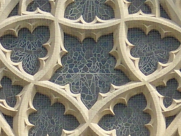 Close-up of intricate stone tracery on gothic architectureClose-up of intricate stone tracery on a gothic window.
