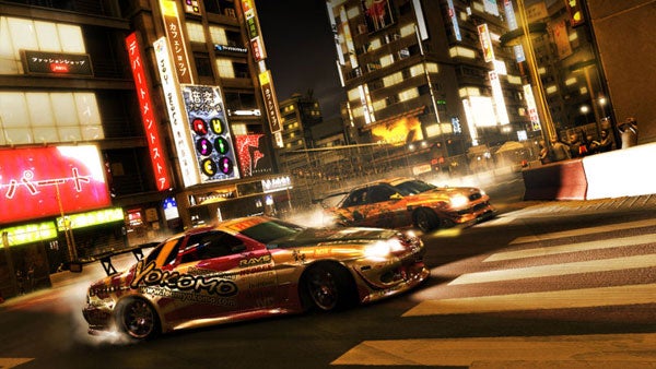 Screenshot from Race Driver: GRID video game showing racing cars at night.