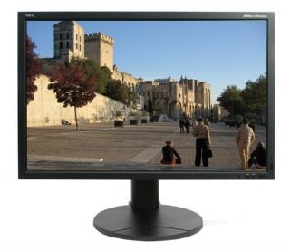 NEC MultiSync LCD3090WQXi monitor displaying a scenic photo.