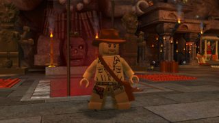 Lego Indiana Jones character in game scene.