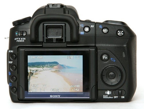 Sony Alpha A350 DSLR camera displaying a beach photo on its screen.Sony Alpha A350 camera displaying a beach scene on its LCD screen.