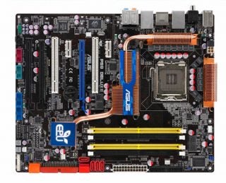 Asus P5Q Deluxe motherboard isolated on a white background.
