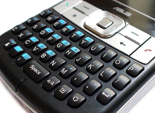 Close-up of Asus M530W Smartphone keyboard and navigation buttons.
