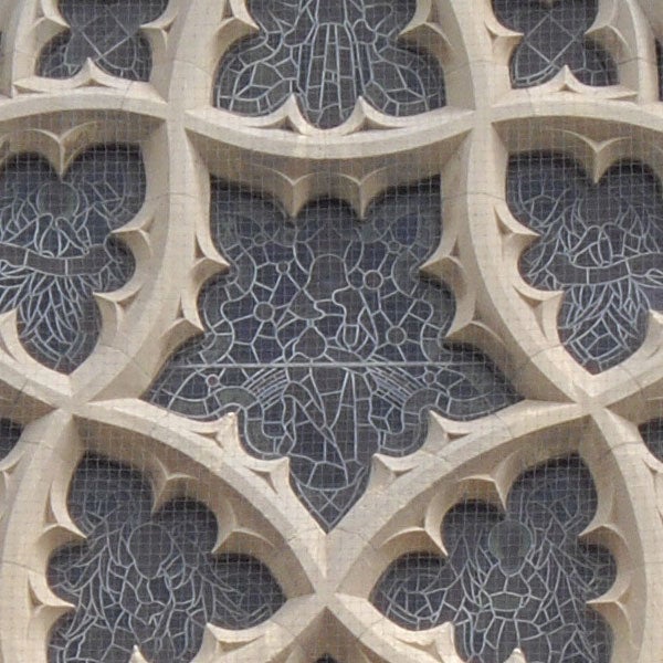 Close-up of intricate stone lattice work.Close-up of intricate stonework architectural detail.