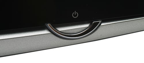 Close-up of LG Flatron W2252TQ monitor power button.Close-up of LG Flatron W2252TQ power button and logo.