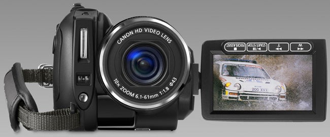 Canon HV30 camcorder with flip-out LCD screen displaying video.Canon HV30 camcorder with flip-out LCD screen showing video.