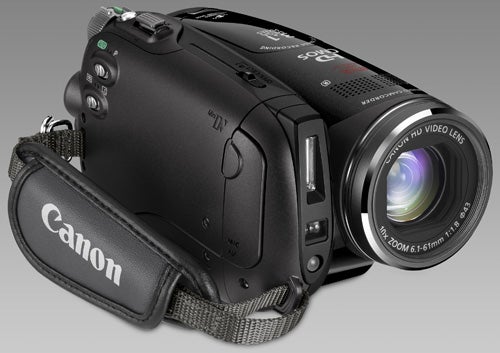 Canon HV30 camcorder with strap on a gray background.Canon HV30 camcorder with strap on grey background.