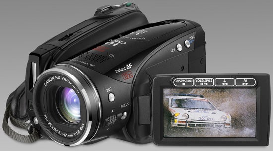 Canon HV30 camcorder with flip-out LCD screen showing video playback.Canon HV30 camcorder with flip-out LCD screen displaying video.