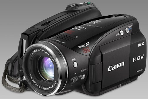 Canon HV30 camcorder with lens and labels visible.