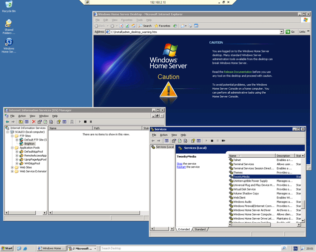 Screenshot of Windows Home Server interface on a computer monitor.Screenshot of Fujitsu Siemens Scaleo Home Server interface.