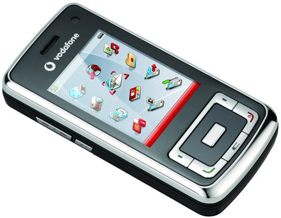 Vodafone 810 phone with colorful display and buttons.Vodafone 810 mobile phone with colorful screen icons.