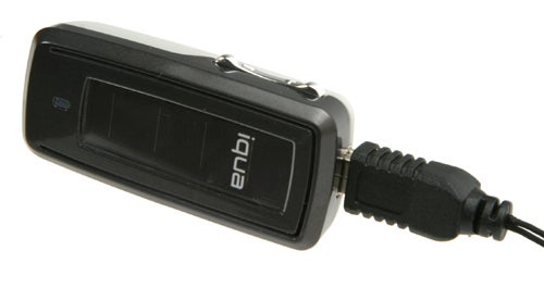 Iqua 603 SUN Bluetooth headset charging via USB cableIqua 603 SUN Bluetooth Headset charging with cable connected.
