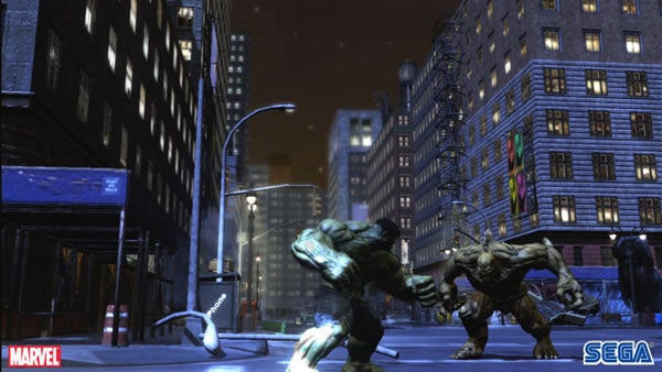Screenshot of The Incredible Hulk video game night scene.The Hulk battling an enemy in a city street at night.