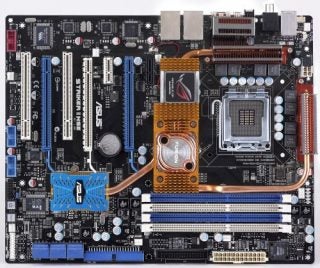 Asus Striker II NSE motherboard with heat pipes and expansion slots.