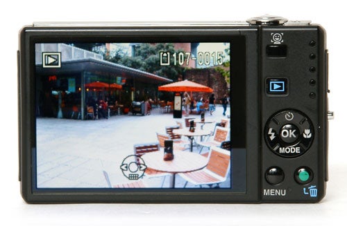 Pentax Optio V20 camera displaying photo on LCD screen.