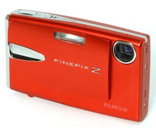 Red Fujifilm FinePix Z20fd digital camera on white background.