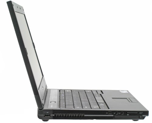 Dell Vostro 1310 laptop with the screen half open.Dell Vostro 1310 notebook with screen open on white background.