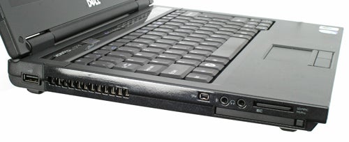 Close-up of Dell Vostro 1310 Notebook's keyboard and side ports.Side view of a Dell Vostro 1310 13.3-inch Notebook.