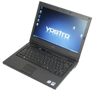 Dell Vostro 1310 laptop with open lid displaying screen.