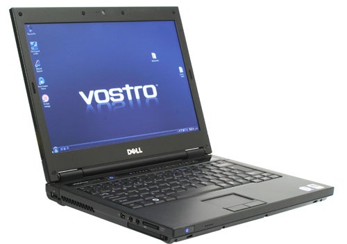 Dell Vostro 1310 laptop with logo on display screen.Dell Vostro 1310 laptop open showing screen and keyboard