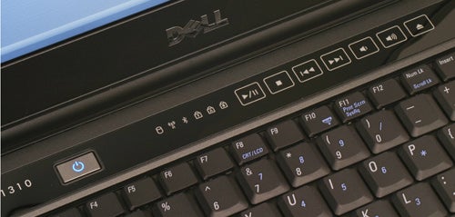 Close-up of Dell Vostro 1310 keyboard and power button.Close-up of Dell Vostro 1310 keyboard and logo.