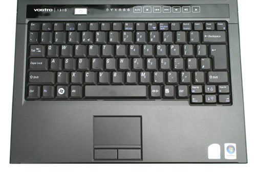 Dell Vostro 1310 laptop keyboard and touchpad close-up.Dell Vostro 1310 notebook keyboard and touchpad close-up.