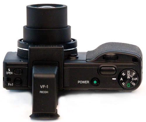 Ricoh GX200 compact digital camera with VF-1 viewfinder attached.Ricoh GX200 camera with VF-1 viewfinder attached.