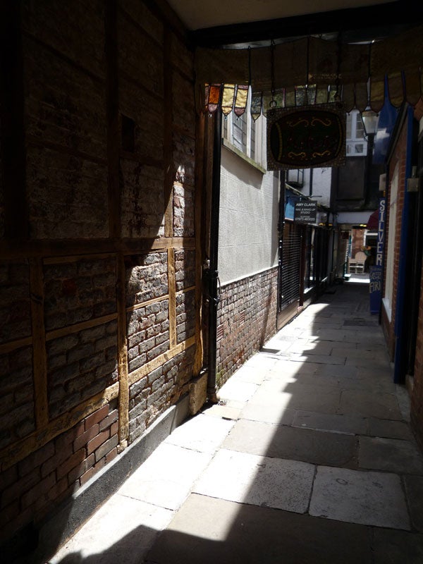 Photo taken by Panasonic Lumix DMC-FX35 showing a sunlit alleyway.Photograph showing dynamic range captured with Panasonic Lumix DMC-FX35.