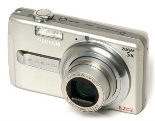 Fujifilm FinePix J50 digital camera with lens extended.