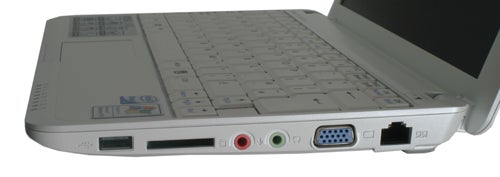 Side view of MSI Wind notebook with ports and white keyboard.MSI Wind netbook side view showing ports and white keyboard.