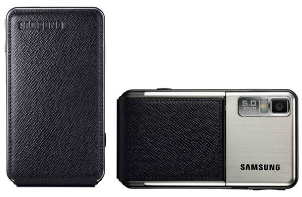 Samsung Tocco F480 phone with camera and leather coverSamsung Tocco F480 phone with leather case and camera view.