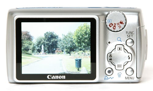Canon PowerShot A470 camera displaying a photograph on screenCanon PowerShot A470 digital camera back view with screen.