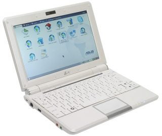 White Asus Eee PC 1000 with screen displaying desktop icons.