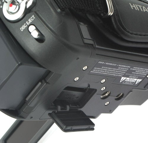 Close-up of Hitachi DZ-BD70E camcorder's disk eject area.Close-up of Hitachi DZ-BD70E camcorder's disc compartment.