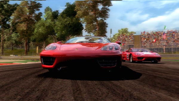 Screenshot from Ferrari Challenge racing game showing two Ferraris on track.Screenshot of Ferrari Challenge racing game with two Ferraris on track.