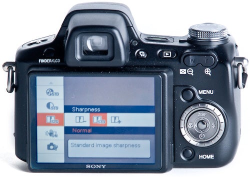 Sony Cyber-shot DSC-H50 camera with settings screen visible.Sony Cyber-shot DSC-H50 camera with menu screen displayed.